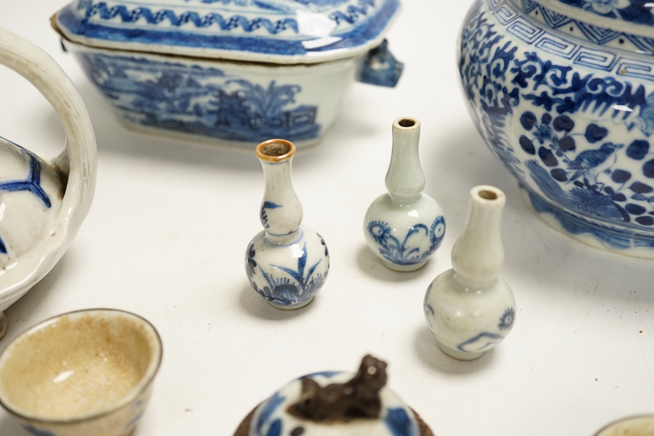 A Japanese Hirado ‘turtle’ teapot, an 18th century Chinese blue and white tureen and cover, an early 20th century jar and cover, teapot and various small vases, covers etc.